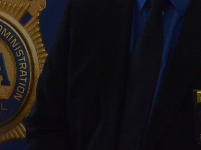 A tip about Scientology infiltrators led DEA to change their hiring practices