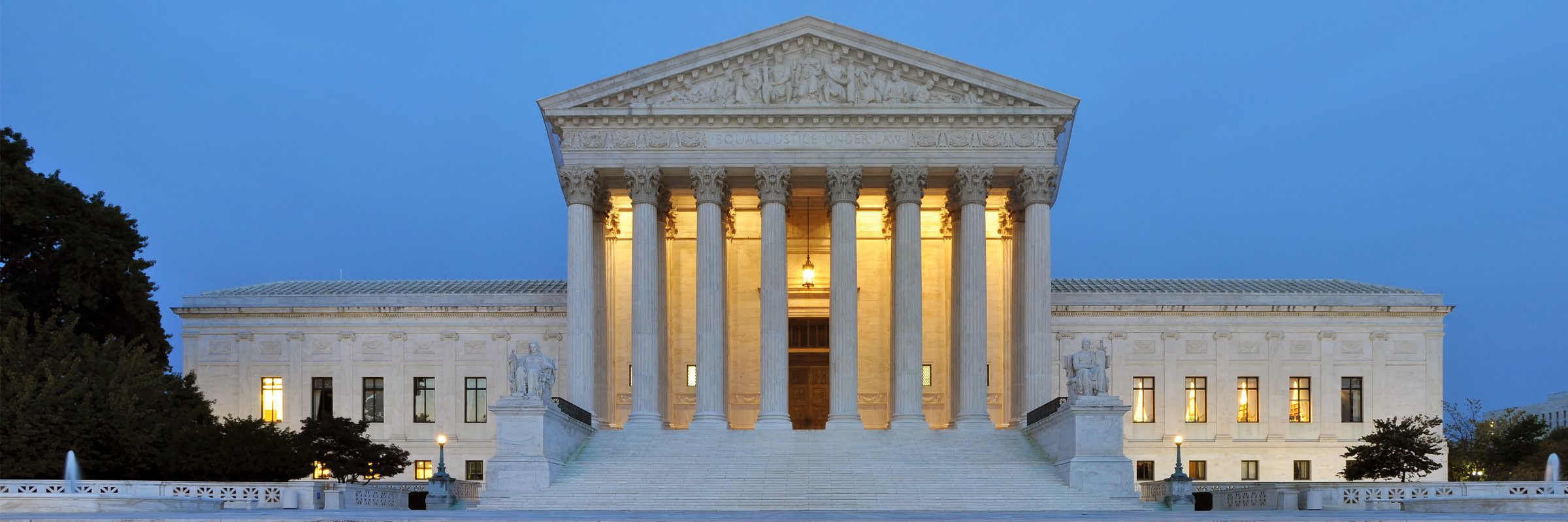 A picture of the Supreme Court building at dawn