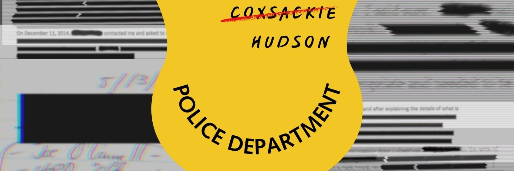 A police badge behind documents