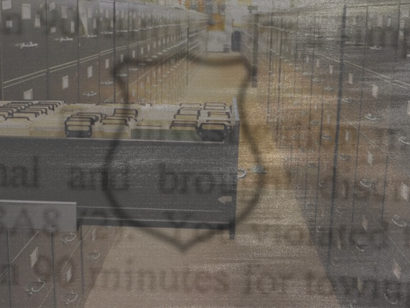 Long hallway with file cabinets overlaid with a smoky hue and a blurry outline of a police badge.