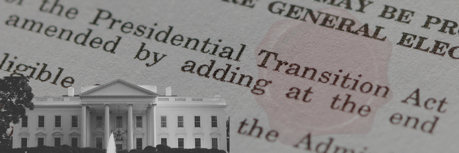 the white house behind a backdrop of documents about the presidential transition