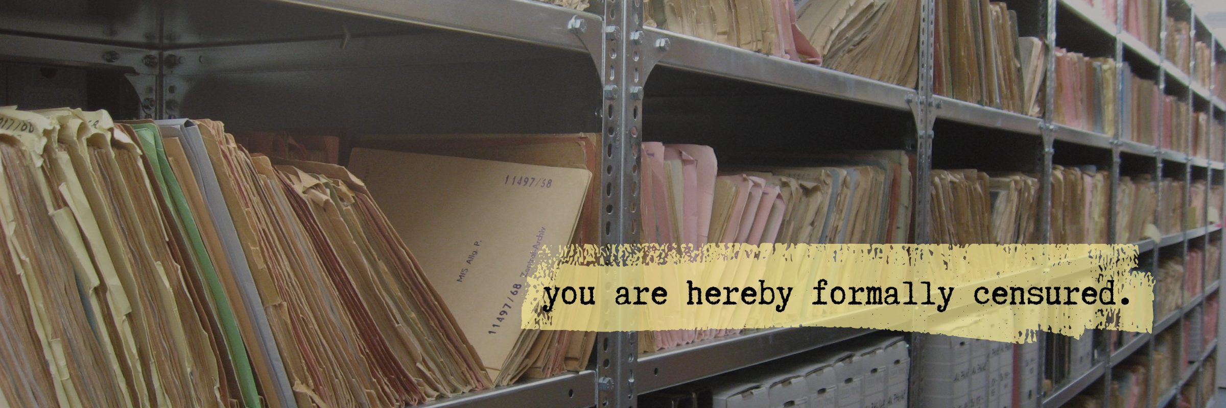 Steel shelves of manila folders with yellow highlighted text "you are hereby formally censured." overlayed on top of the image of the shelves of folders.