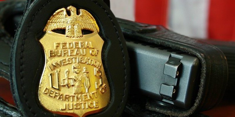fbi badge and gun
